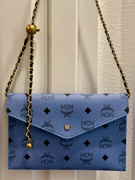 MCM Handbags - NIB MCM Sky Blue Logo Envelope Clutch/Crossbody. Includes classy chain/box/dusty
